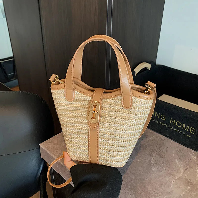 Women's bucket handbag in PU with sewing line detail, available in brown and apricot colours
