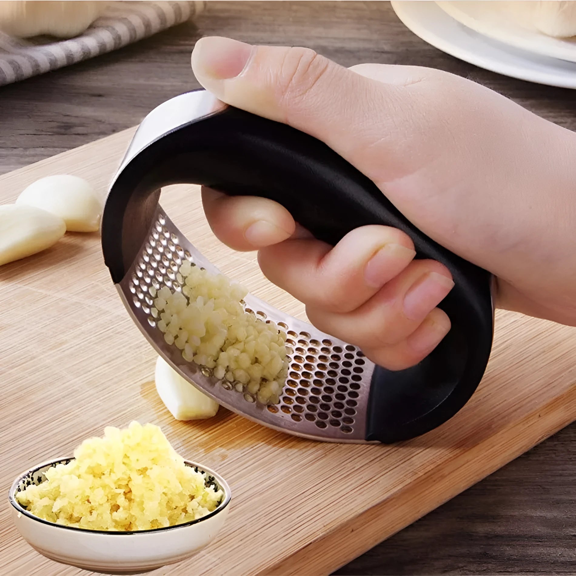 304 stainless steel garlic press with ergonomic handle in choice of colours