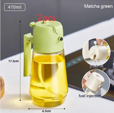 Glass olive oil sprayer bottle with ergonomic handle in beige, showing spray and pour functions.