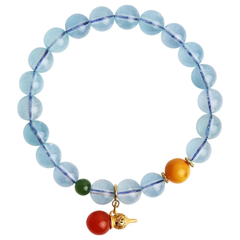 Iced aquamarine crystal bracelet with 8mm geometric beads and ethnic retro styling