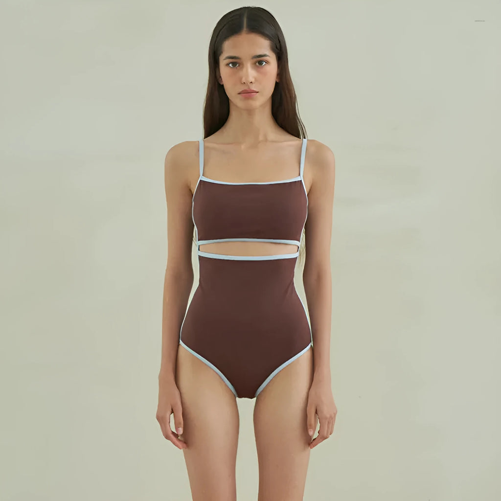 Brown women's triangle top one-piece swimsuit on hanger showing front design