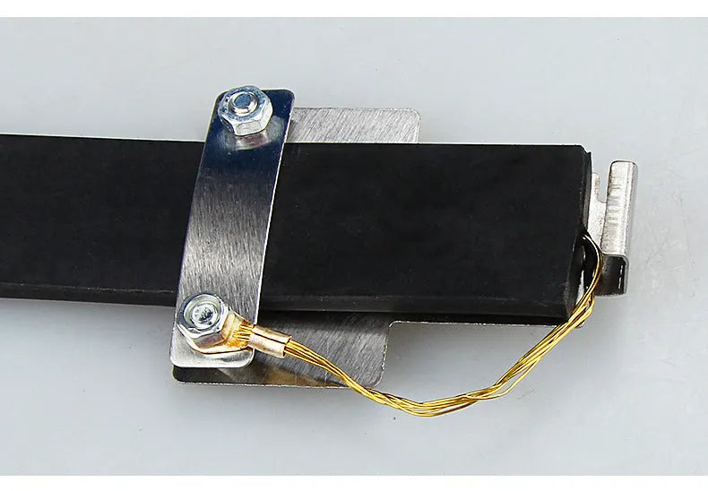Black rubber and copper car electrostatic grounding chain, 370 mm long, for static discharge.