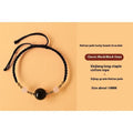 Hand-woven red rope bracelet with Hetian jade beads and a detailed zodiac charm pendant.