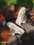 Green low-top casual shoes with star pattern stitching and thick rubber sole.
