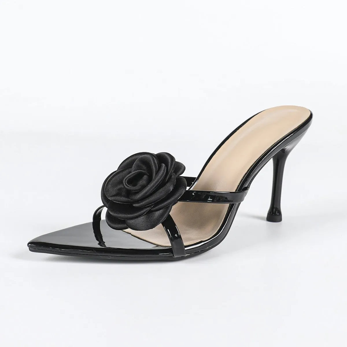 Black patent leather pointed stiletto heel sandals with three-dimensional flower decoration on upper