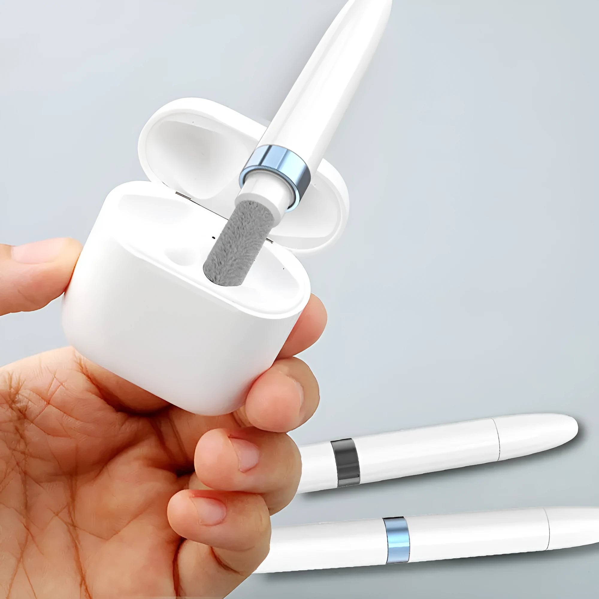 Blue cleaning pen with three-layer brush system for electronic device maintenance
