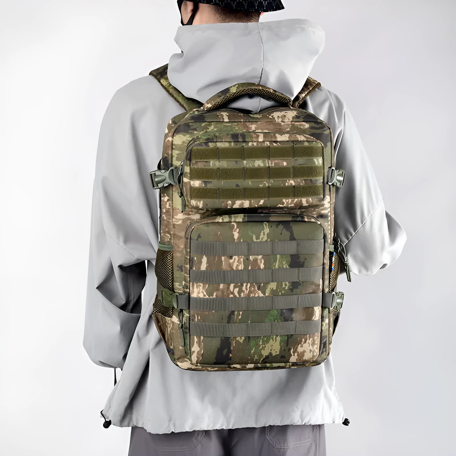 Large outdoor mountaineering backpack in camouflage pattern with curved shoulder straps