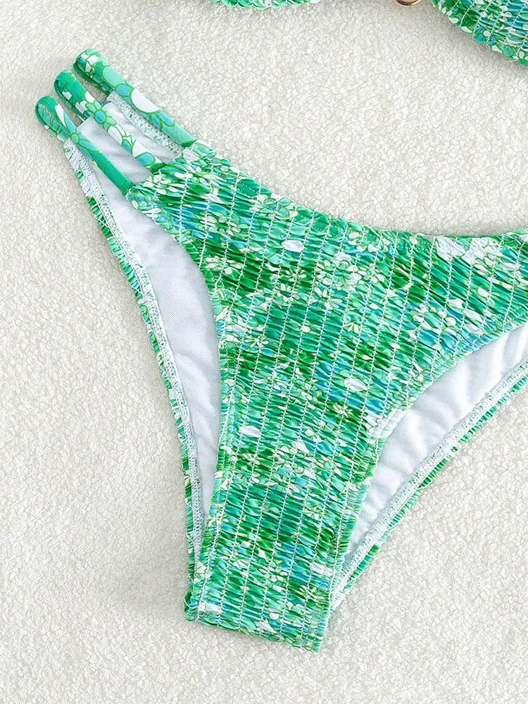 Women's floral bikini swimsuit with high-waist briefs in solid colour patterns