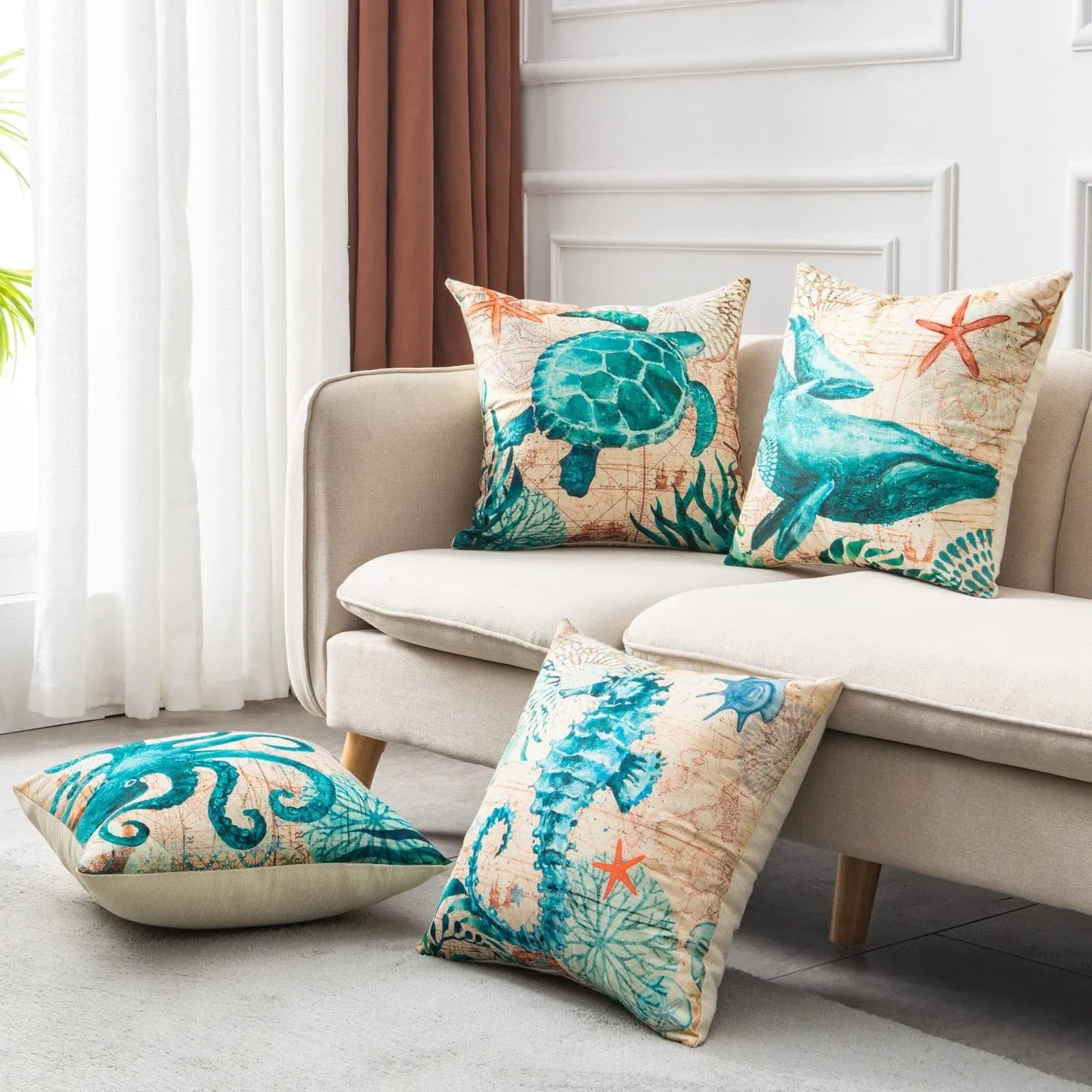 Square linen cushion cover with blue sea turtle print, showing invisible zipper closure.