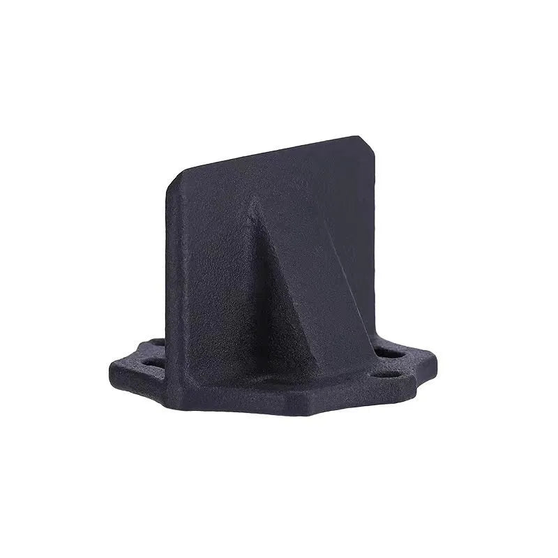 Small square cast iron wood splitter tool on a wooden background.