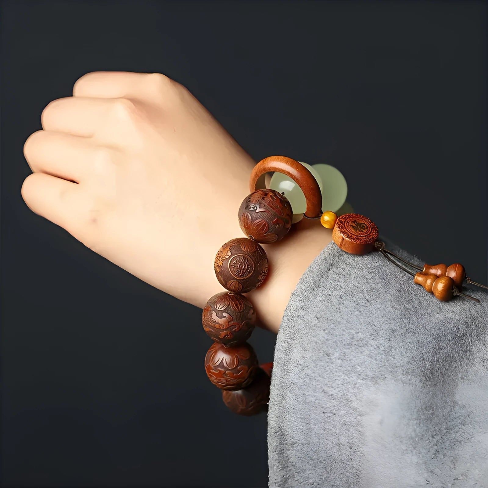 Rosewood flexible bracelet with carved Fu characters on 12 wooden pieces