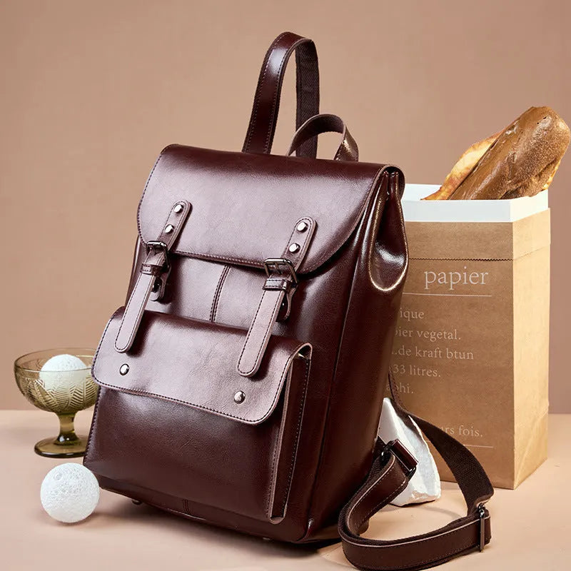 Genuine leather women's computer backpack in black, brown, and coffee brown colours