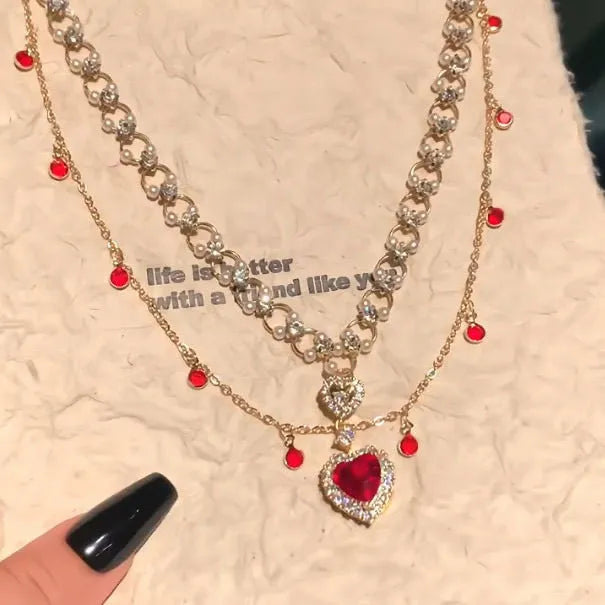 Red love heart double layer twin necklace on a regular chain, adjustable from 41cm to 50cm.