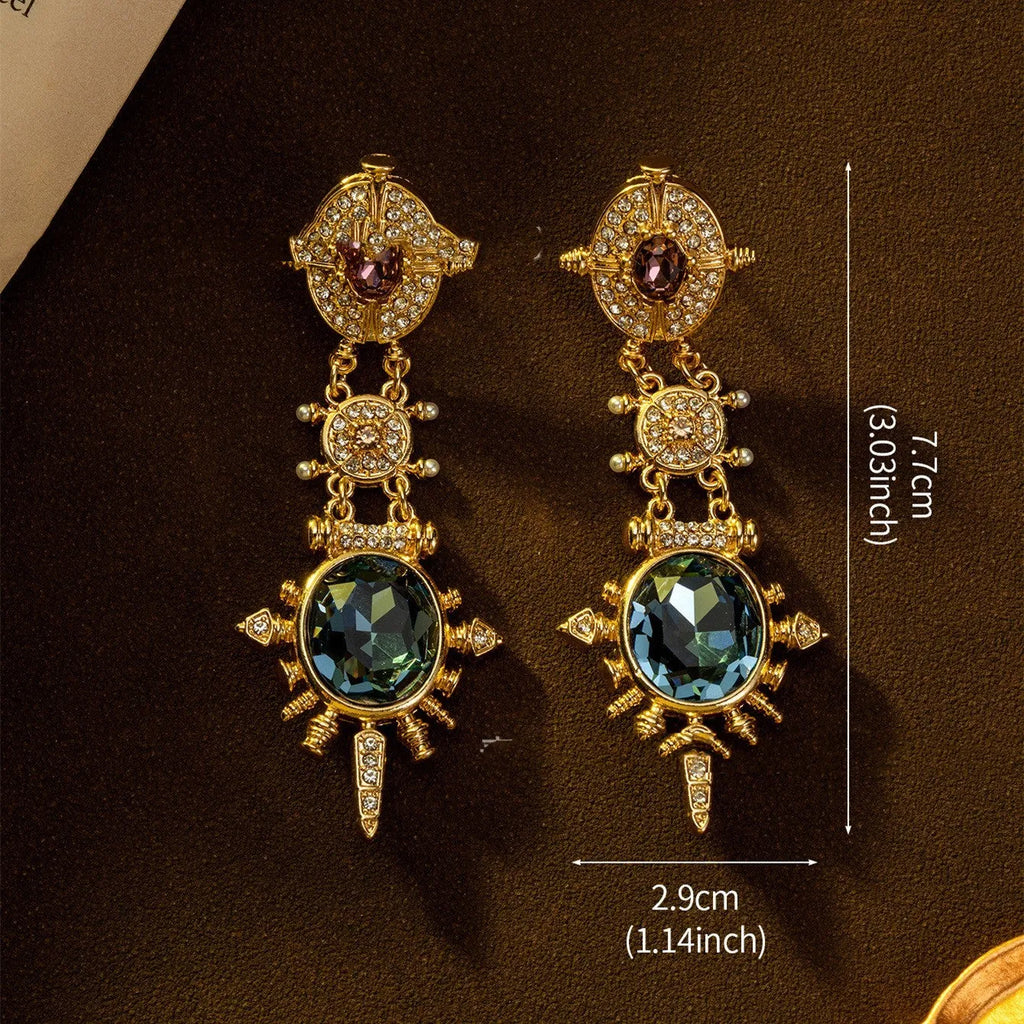 Gold geometric round stud earrings with diamond treatment surface detail