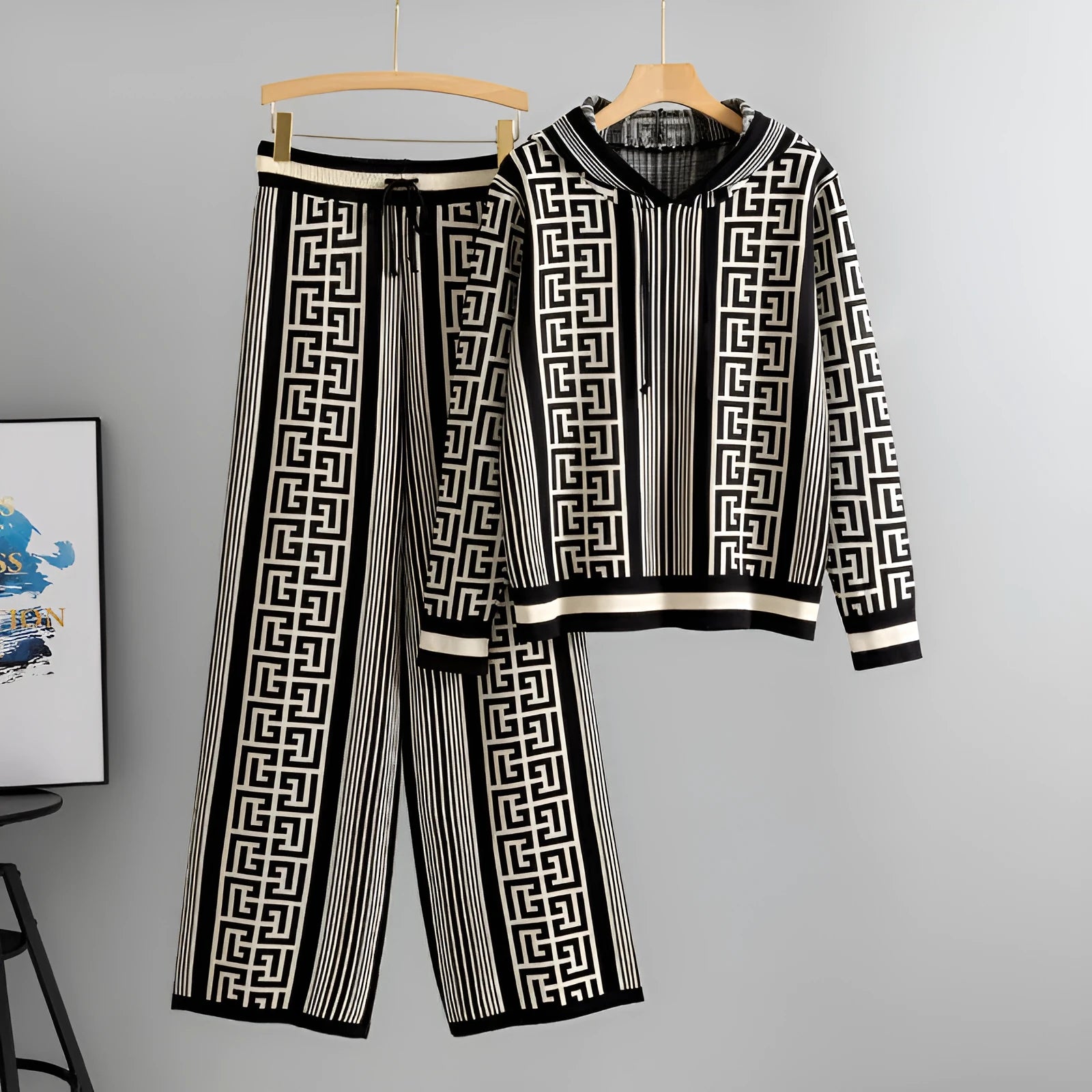 Women's casual knit suit set with hooded sweater top and wide-leg trousers in viscose fibre, available in khaki, black, rose red, and brown colours.