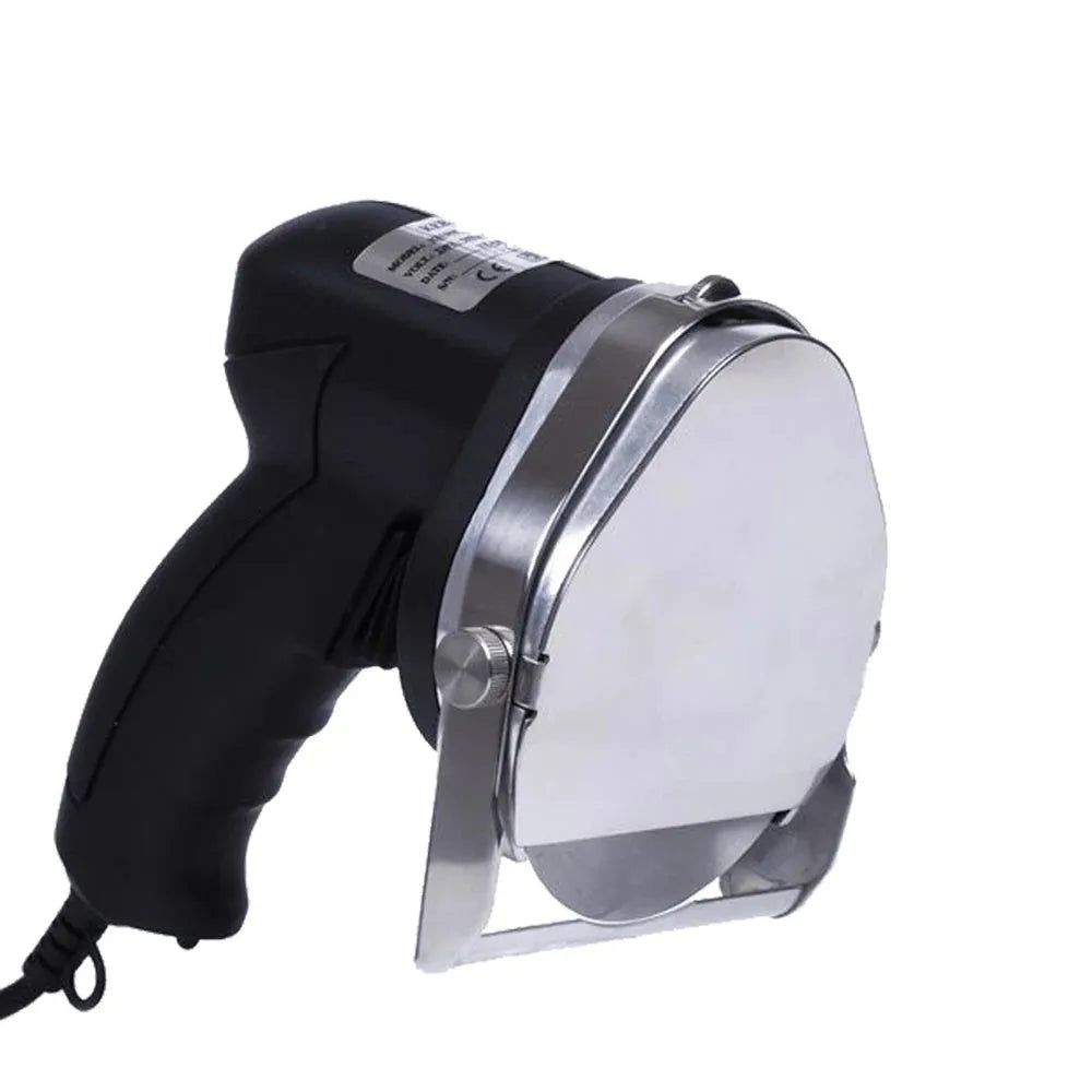 Black electric meat cleaver with 80W motor and EU plug on a work surface.