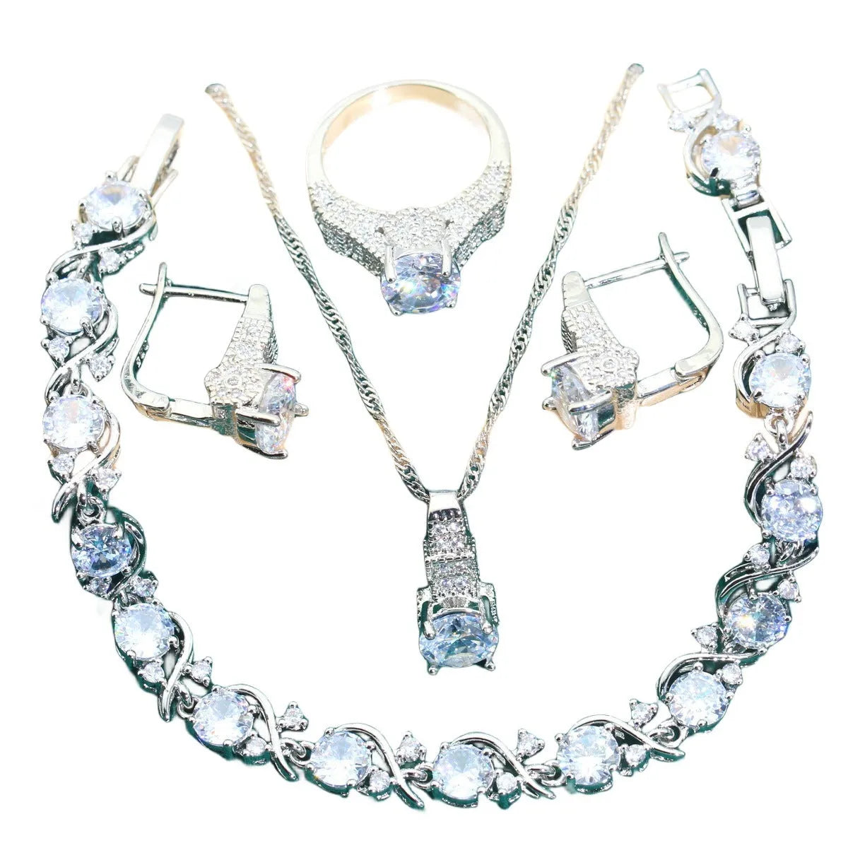 Four-piece bridal jewellery set with zircon details, water wave chains, and alloy pendants in presentation