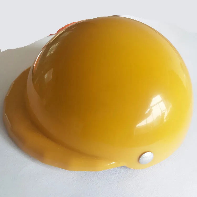 A pink plastic dog hat designed like a motorcycle helmet on a white background.