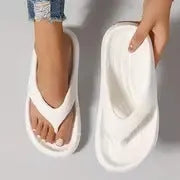 Women's thick-soled EVA flip-flops in black, white, or grey colours with non-slip and anti-odour properties