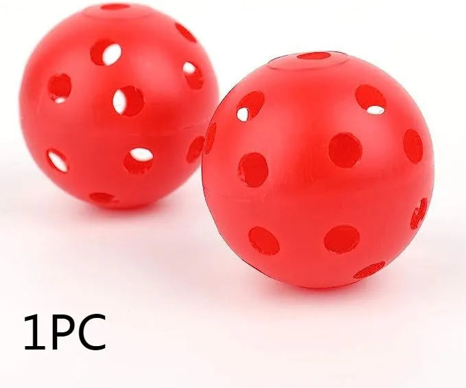 Multi-colour golf practice balls in red, orange, blue, green, white, and yellow, shown in a net pocket.