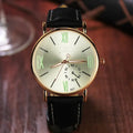 Roman scale luminous quartz watch with round dial and pin buckle in black or brown belt
