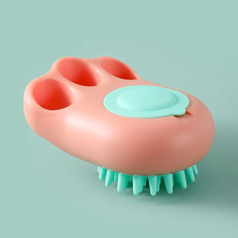 Claw-shaped silicone bath brush for dogs and cats in blue, pink, white, or yellow.