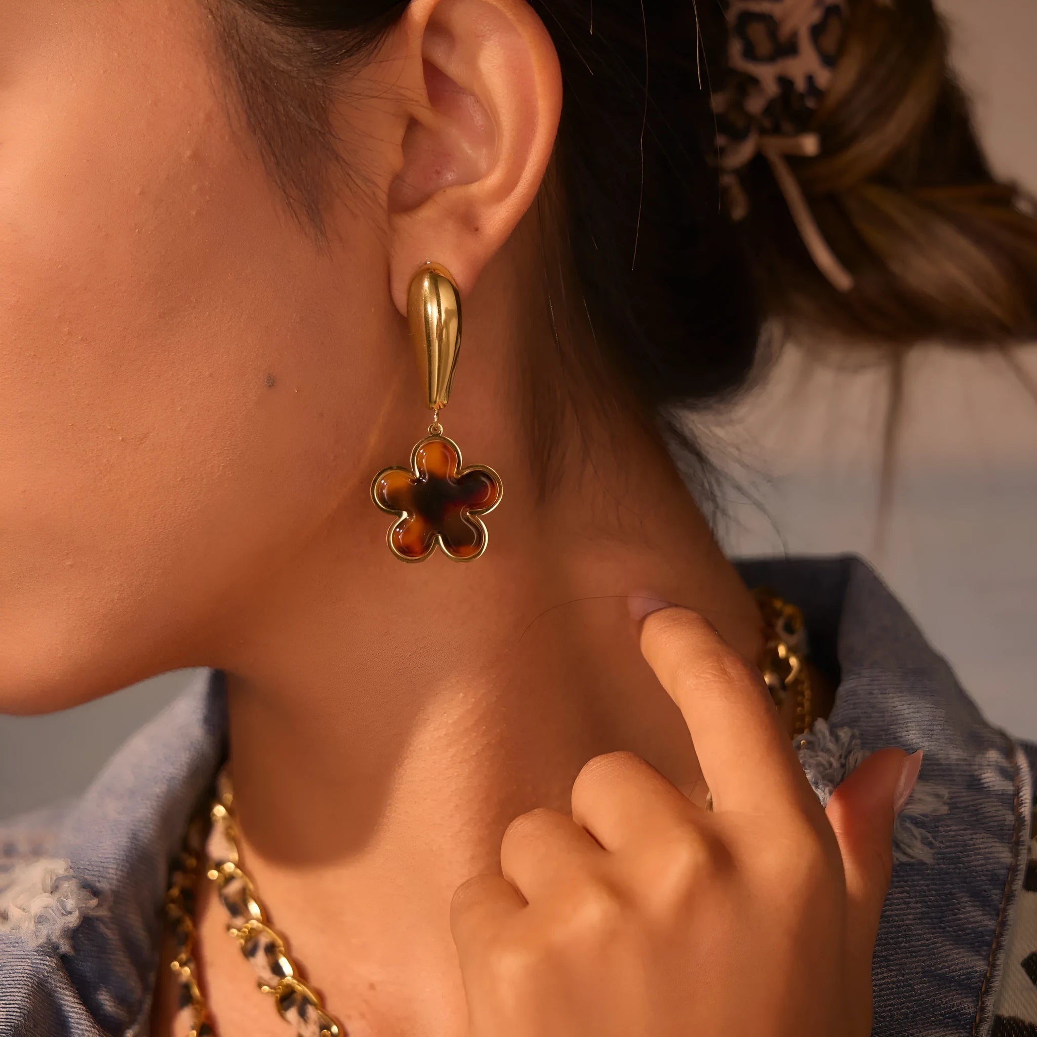 Women's tortoiseshell resin electroplated earrings in heart and flower designs with 18K stainless steel construction