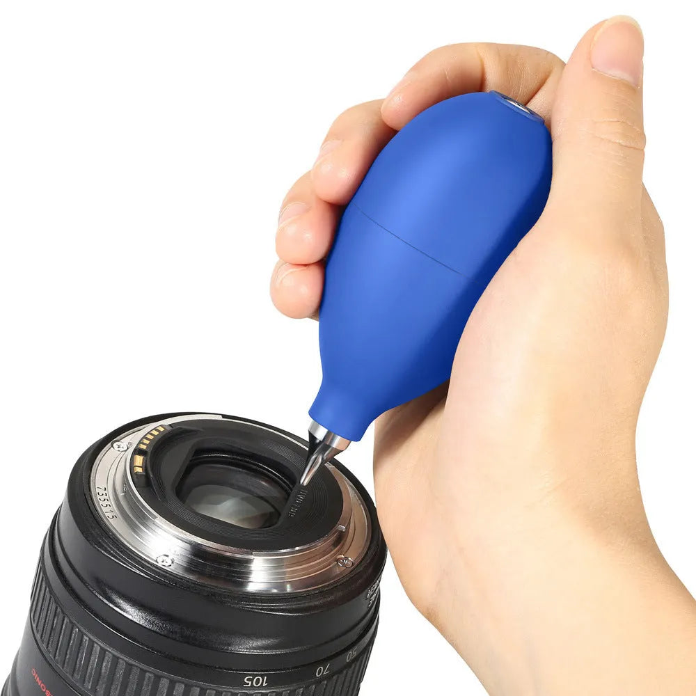 Blue rubber manual air blower dust removal tool for cleaning camera lenses and mobile phones.