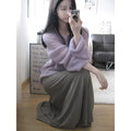 Purple sleeveless women's blouse with princess sleeves and a shoulder strap detail.