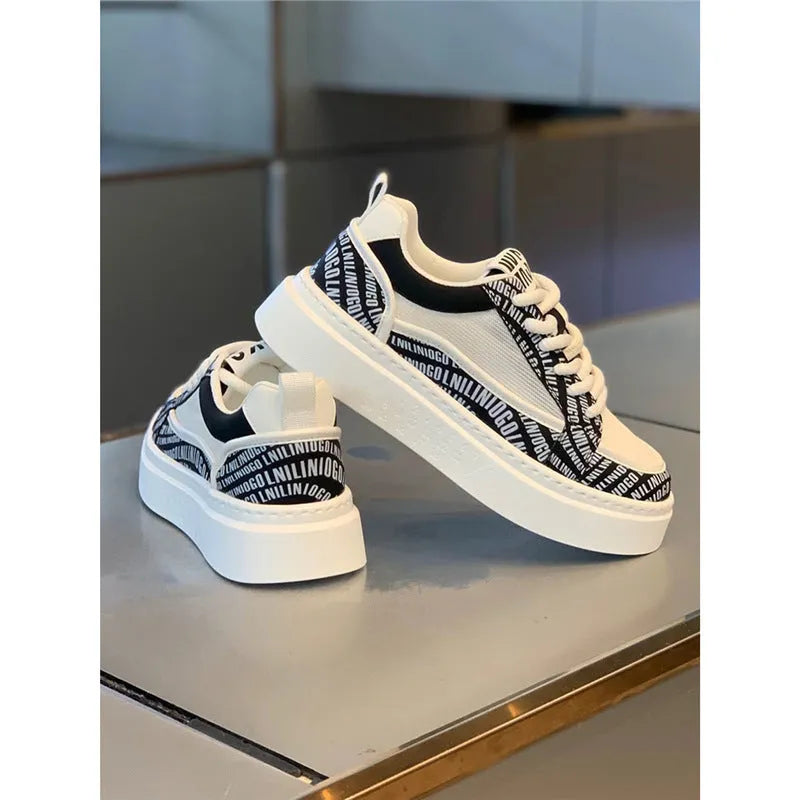 Men's white canvas board shoes with thick rubber sole and low heel, shown in white, black, grey, and green colour options.