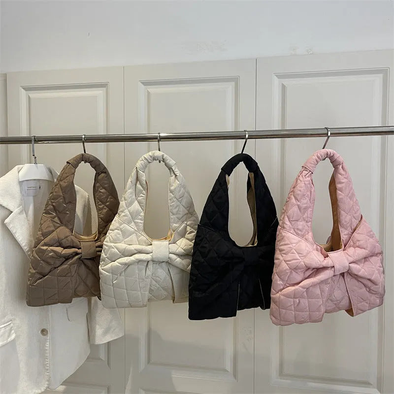 Women's one shoulder handbag in cotton with polyester lining, soft horizontal square shape, zipper change bag, shown in white black khaki pink