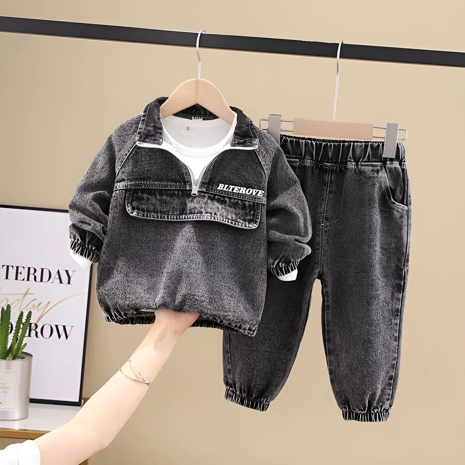 Boys' black denim suit set with long sleeves in Korean style, showing both top and trousers