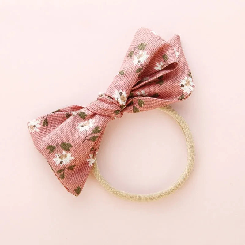 Children's knotted bow hair ring with fabric construction and printed patterns