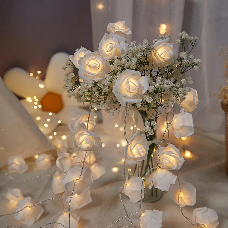 LED rose fairy lights with battery pack showing pink foam rose-shaped covers on 1.5 metre cable