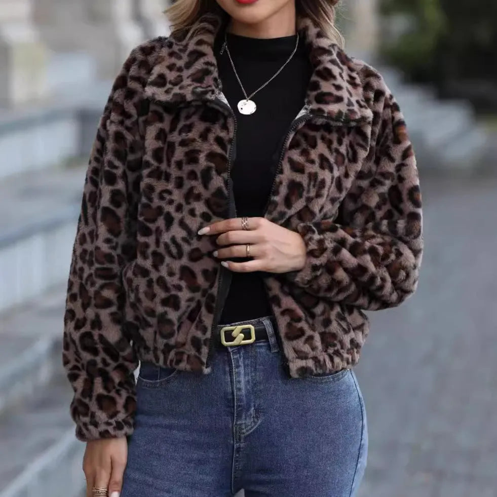 Women's loose-fitting leopard print plush coat with a front zipper and long sleeves.