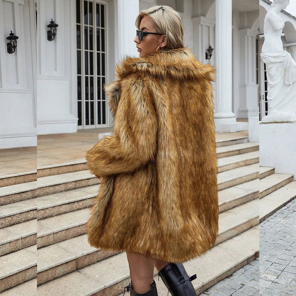 Yellow loose-fit women's faux fur coat with regular sleeves on a size chart.