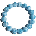 Blue handmade Bodhi bracelet with natural crystal stones and pearl accents in Maillard style.
