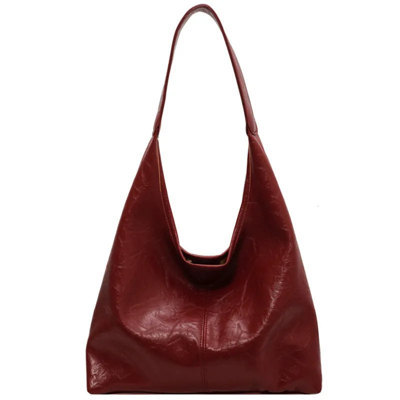 Soft leather shoulder bag with large capacity and sandwich pocket in street trend style