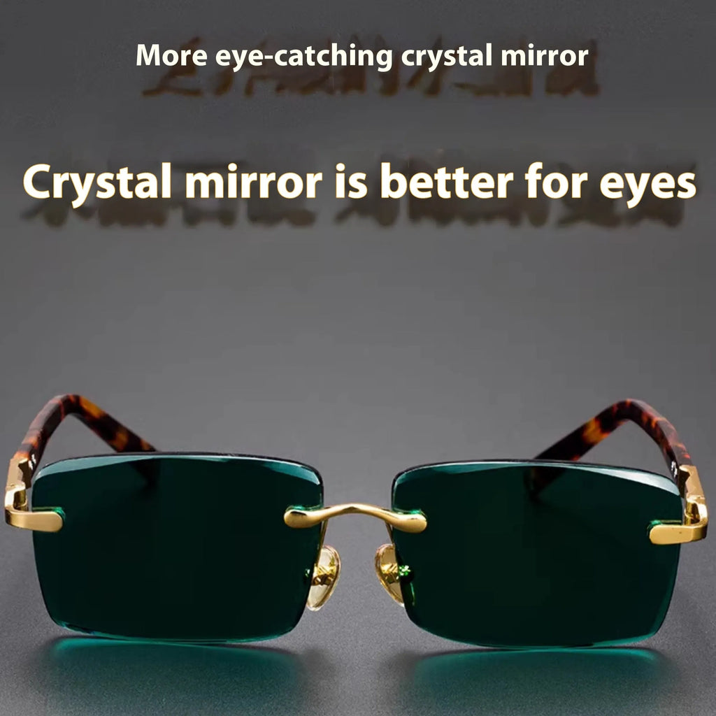 Frameless dark green crystal sunglasses with a glasses case and cleaning cloth.
