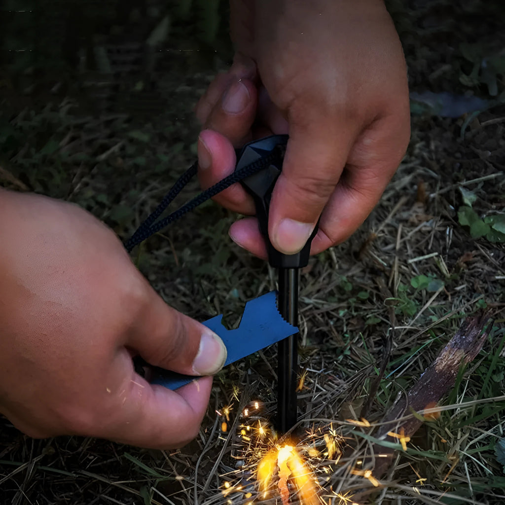 Black outdoor multifunctional survival flint with magnesium rod and stainless steel scraper tool.
