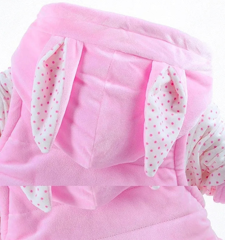 Girls' pink autumn winter three-piece clothing set with jacket, vest, and long trousers on a hanger.