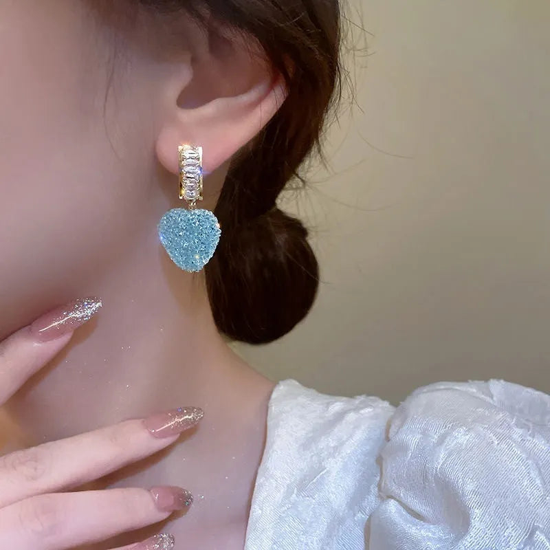 Pink and blue candy heart stud earrings made from alloy metal