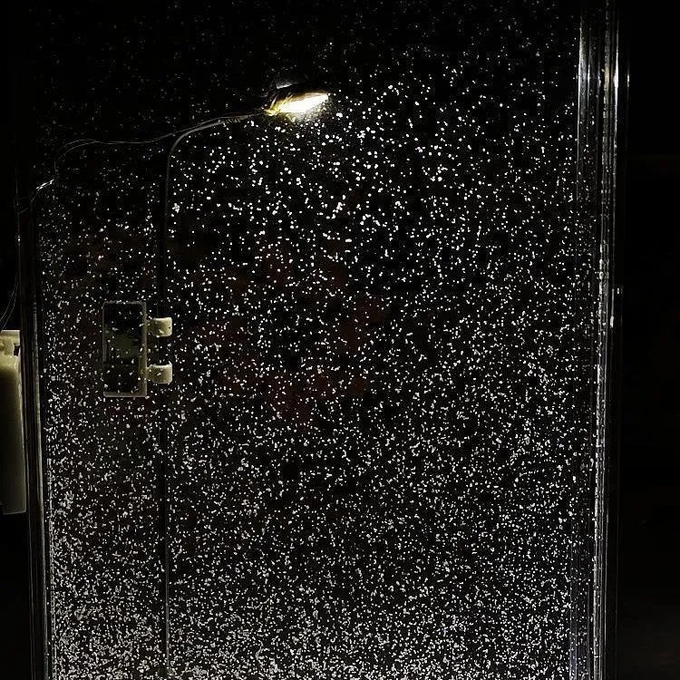 DIY magic snowy landscape night light kit with LED lights and snow effect for Christmas desktop decor.