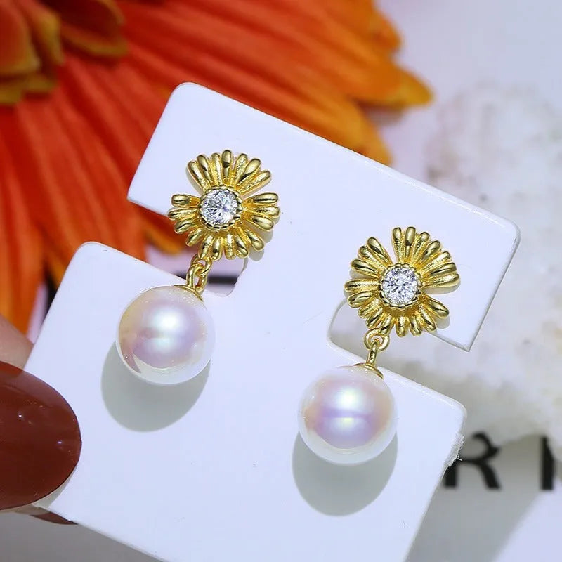S925 sterling silver baroque flower earrings on a silver ring holder, showing gold and silver colour frame options.