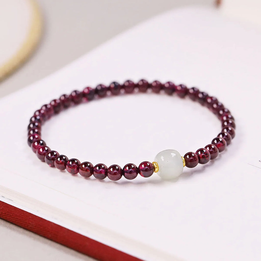 Natural garnet bracelet with U-shaped design showing 4mm and 6mm bead size options