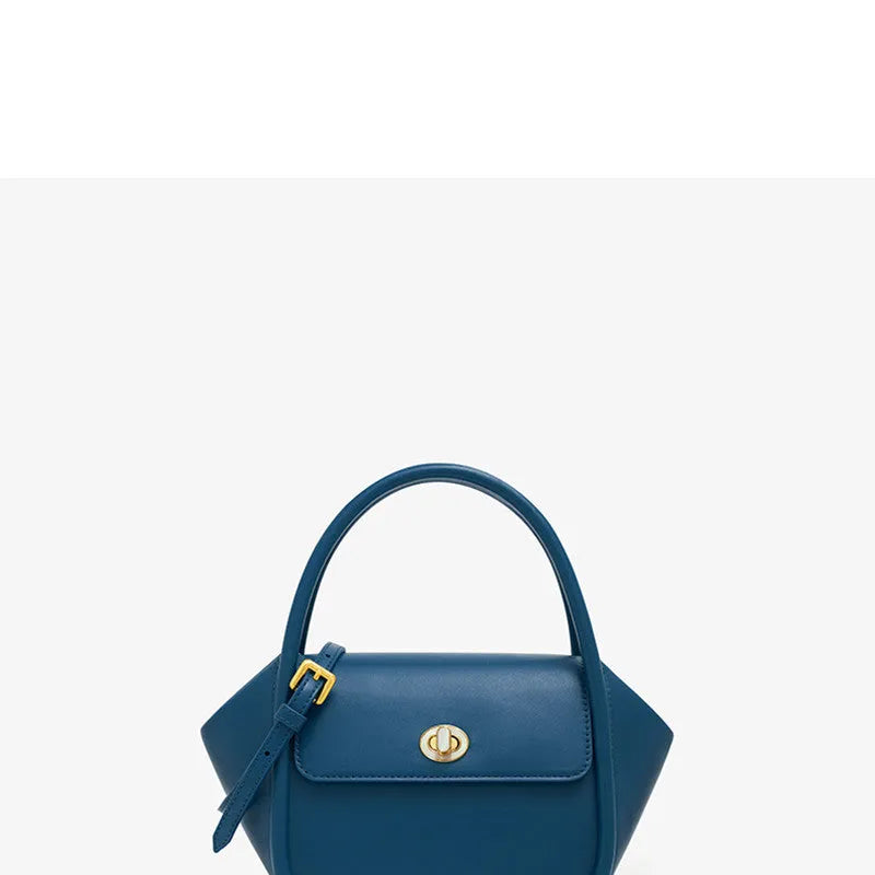 Women's leather wing shape tote bag with cross-body strap in four colour options showing buckle detail