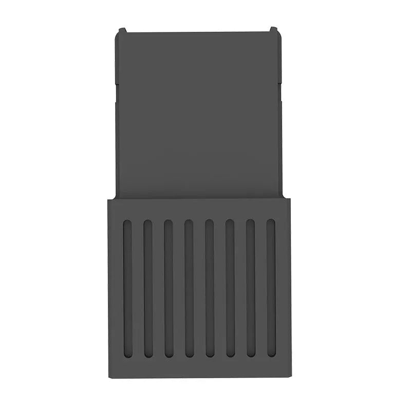 Aluminium Xbox Series X/S hard drive switching box with CFexpress interface and screwdriver.