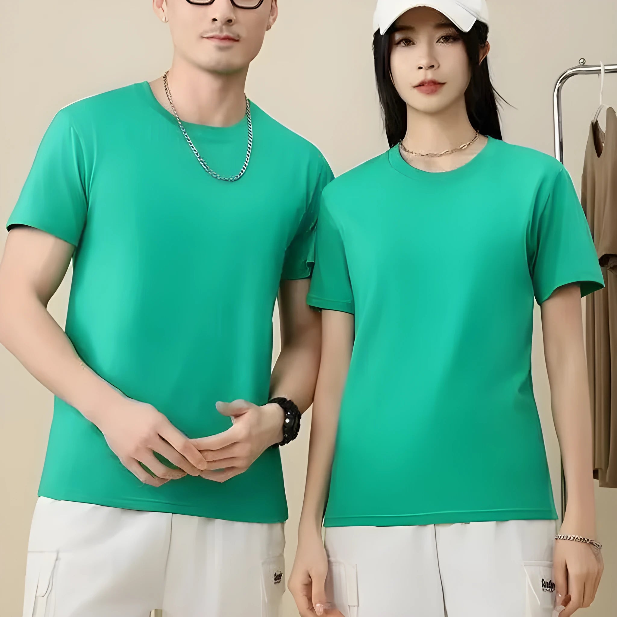 Loose-fit cotton T-shirt for men and women in multiple colour options including peacock blue and orange red.
