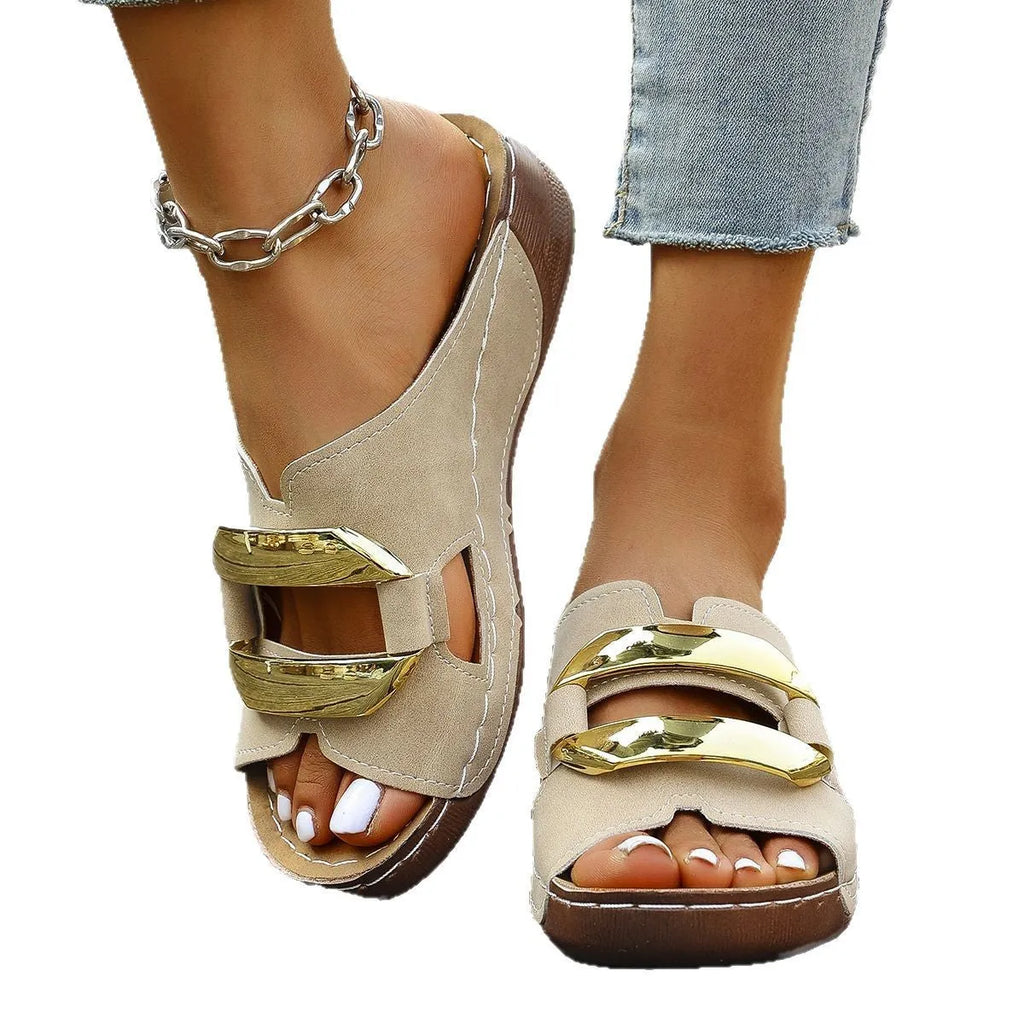 Roman style platform flip-flop sandals in a solid colour on a white background.