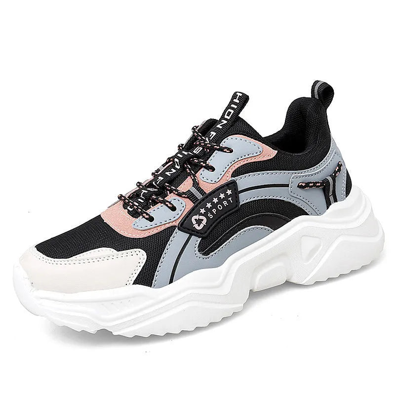 Women's thick-soled casual sports shoes with mesh upper and buckle detailing in black colour